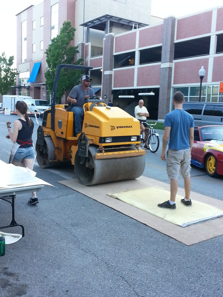 Steam roller. Standing on plate until steam roller engaged it keeps it from sliding and smearing ink!